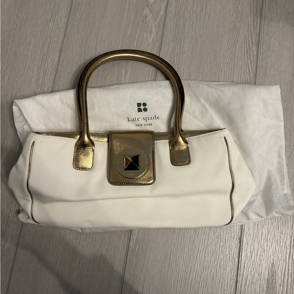 kate spade Handbags - Kate Spade Ivory and Gold handbag.